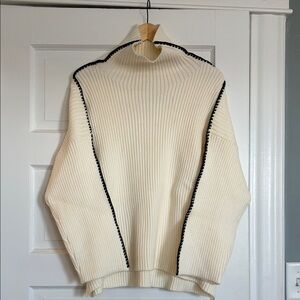 Edan Elegant Cream Sweater with Black Trim